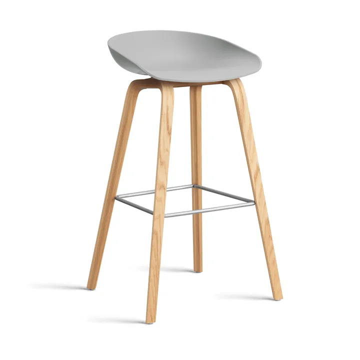 About a Stool AAL32 High 2.0 bar stool lacquered oak base - Concrete grey-stainless steel footrest - HAY