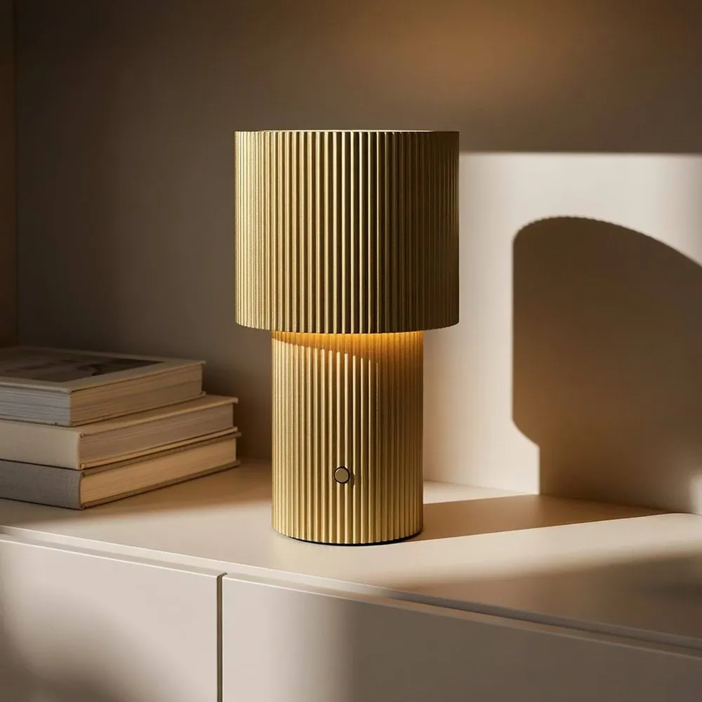 Iluma portable table lamp, Gold Herstal