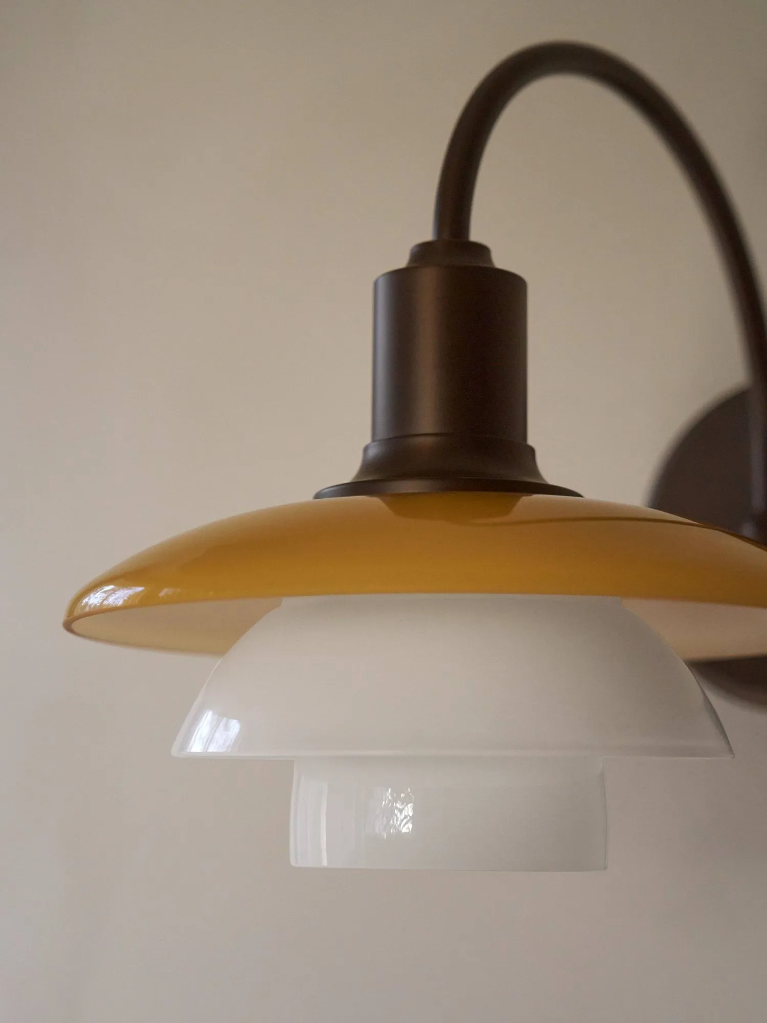PH 2/2 Centenary Edition wall lamp, Amber-opal white, plug Louis Poulsen