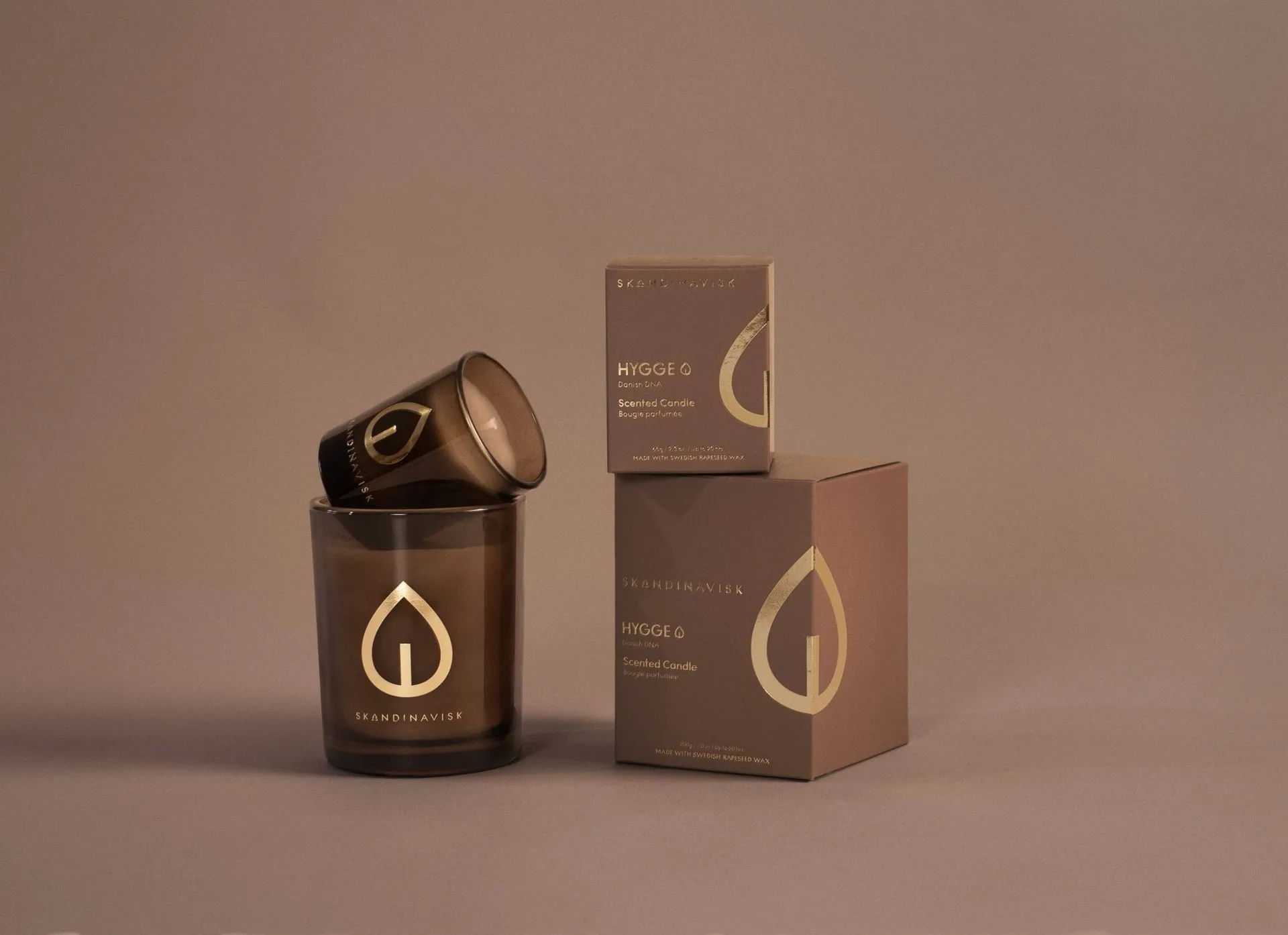 Hygge Gold Symbol scented candle, 65 g Skandinavisk
