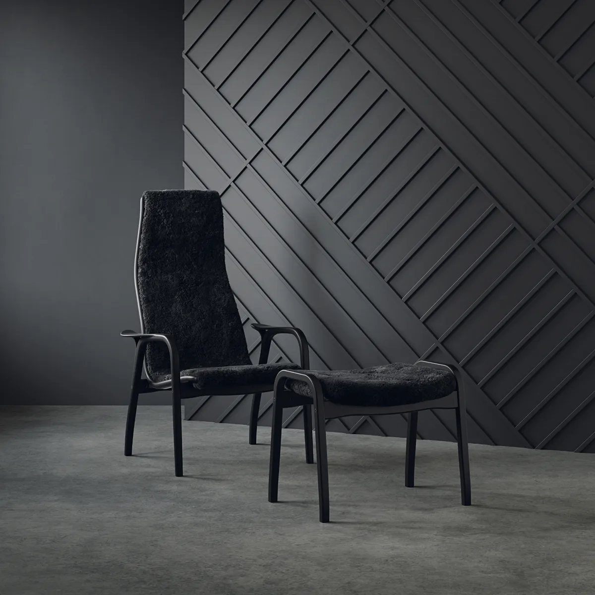 Lamino armchair and footstool Black Edition, Black Swedese