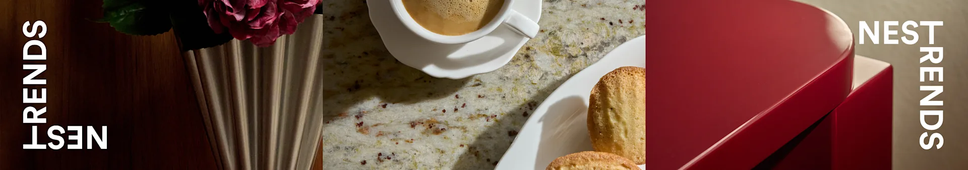Coffee cup, madeleine cookies, and a rose in a fluted vase on a speckled countertop next to a red box with 'NEST TRENDS' text.
