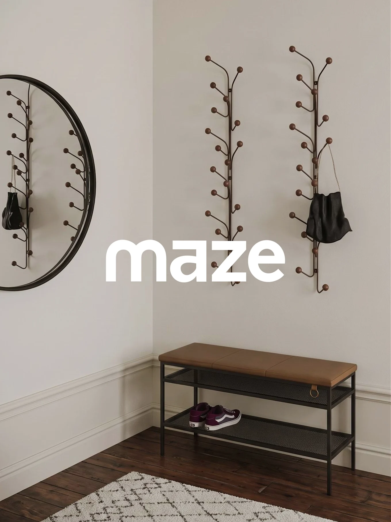 An entryway with a MAZE logo. It features two wall-mounted coat racks, a round mirror, a bench with a brown cushion, and sneakers.